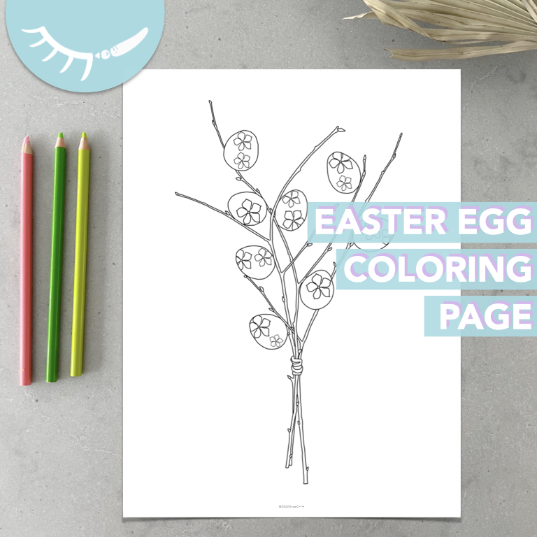 Printable pdf coloring page of several eggs on branches. The eggs have a flower pattern on them.