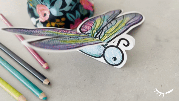 Printable dragonfly coloring page that turns into a 3D dragonfly paper craft.